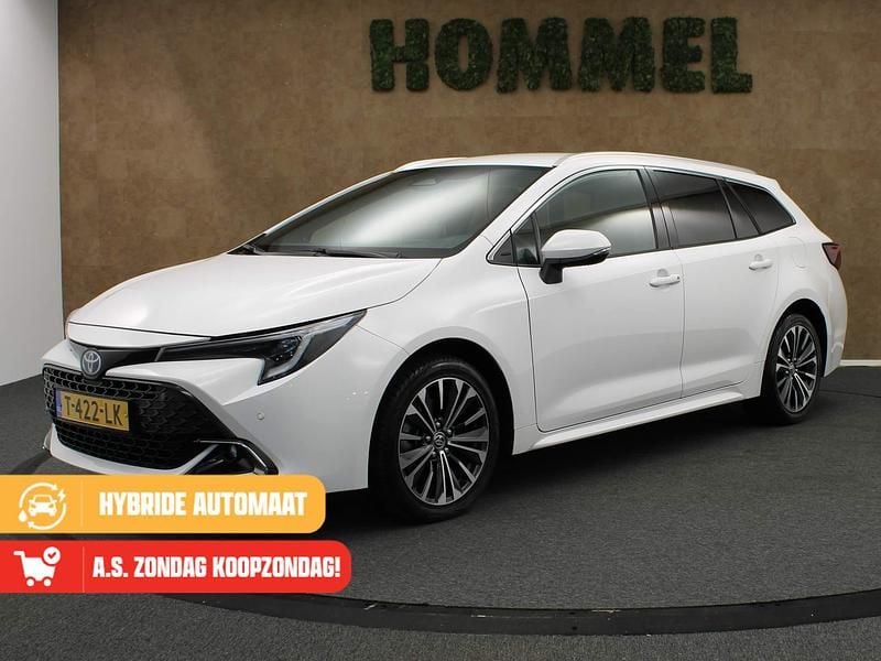 Wit Gebruikt 2023 Toyota Corolla Hybrid Business Edition Stationwagen | € 31.145 - Afbeelding 1/4