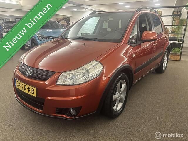 Oranje (metallic) Gebruikt 2008 Suzuki SX4 Exclusive Sedan | € 5.890 (Iets duurder) - Afbeelding 1/4