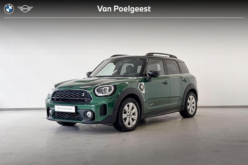 British racing green metallic (groen metallic) Gebruikt 2021 Mini Cooper Countryman Classic SUV | € 29.995 (Eerlijke prijs) - Afbeelding 1/4