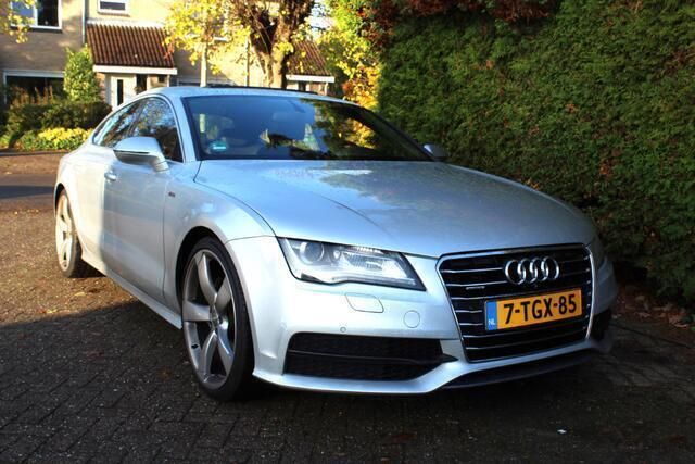 Grijs Gebruikt 2014 Audi A7 Sportback Proline Hatchback | € 19.950 (Eerlijke prijs) - Afbeelding 1/4