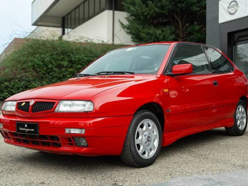 Roodrosso Gebruikt 1998 Lancia Delta Coupé | € 13.500 - Afbeelding 1/4