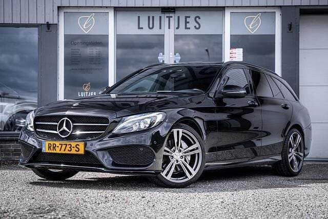 Zwart Gebruikt 2018 Mercedes C180 AMG Stationwagen | € 22.500 (Eerlijke prijs) - Afbeelding 1/4