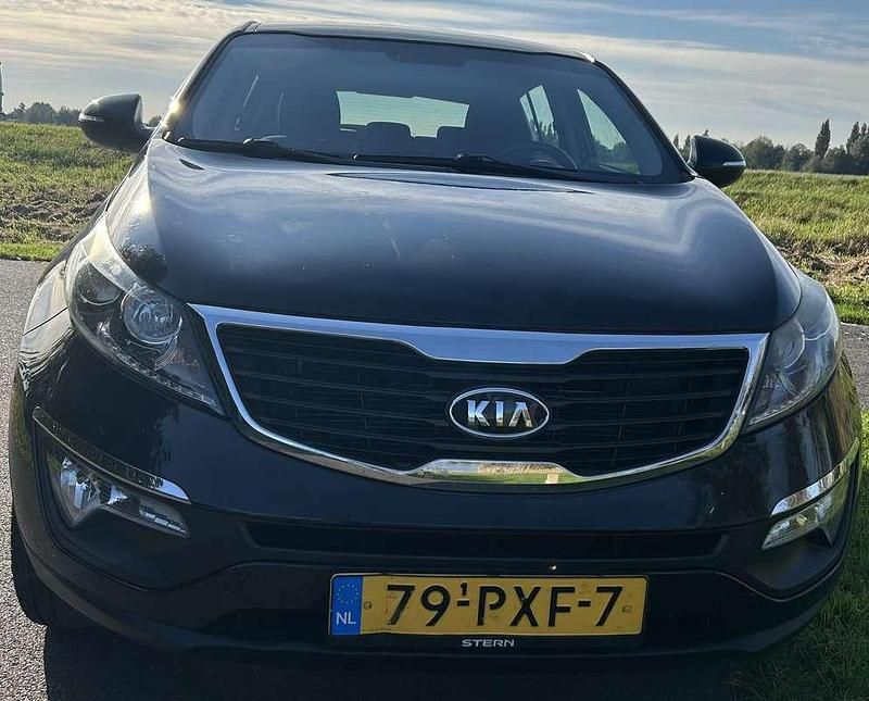 Zwart Gebruikt 2011 Kia Sportage SUV | € 5.850 (Eerlijke prijs) - Afbeelding 1/4