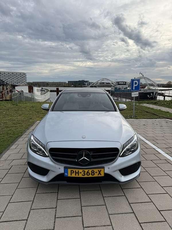 Grijs Occasion 2015 Mercedes C180 Prestige Sedan | € 13.999 (Eerlijke prijs) - Afbeelding 1/4