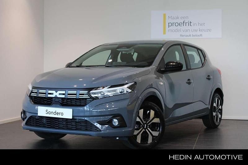 , metallic lak Nieuw 2025 Dacia Sandero Comfort Hatchback | € 22.821 (Eerlijke prijs) - Afbeelding 1/4
