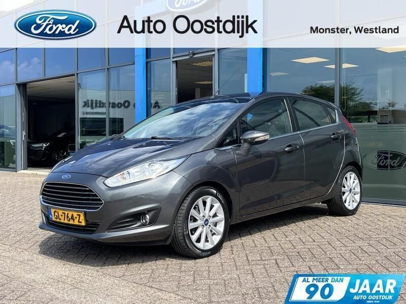 Grijs Gebruikt 2015 Ford Fiesta Titanium Hatchback | € 8.450 (Eerlijke prijs) - Afbeelding 1/4