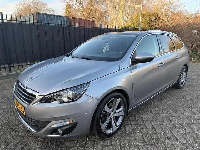 Grijs (metallic) Occasion 2014 Peugeot 308 SW Stationwagen | € 8.950 (Eerlijke prijs) - Afbeelding 1/4