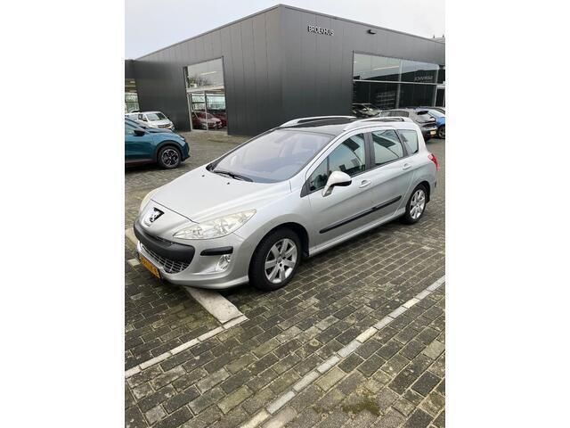 Grijs Gebruikt 2010 Peugeot 308 Stationwagen | € 1.999 (Eerlijke prijs) - Afbeelding 1/4
