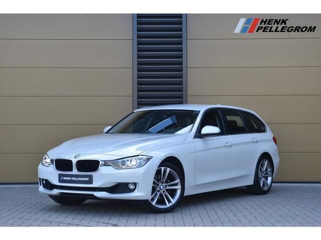Wit Gebruikt 2014 BMW 320 Executive Stationwagen | € 14.950 (Iets duurder) - Afbeelding 1/4