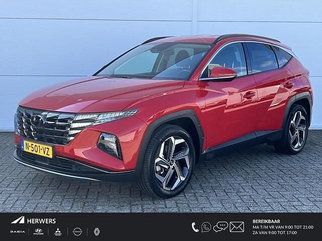 Engine red (jhr) Gebruikt 2022 Hyundai Tucson Comfort SUV | € 27.935 (Super prijs) - Afbeelding 1/4
