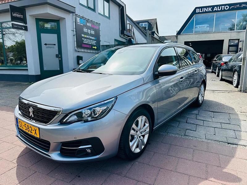 Grijs Occasion 2018 Peugeot 308 SW Stationwagen | € 8.999 (Super prijs) - Afbeelding 1/4