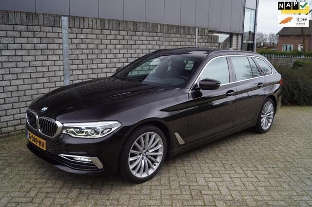 Bruin Gebruikt 2019 BMW 530 Executive Stationwagen | € 26.950 (Goede deal) - Afbeelding 1/4