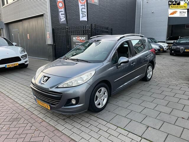 Grijs, metallic lak Gebruikt 2011 Peugeot 207 Style Stationwagen | € 2.499 (Eerlijke prijs) - Afbeelding 1/4
