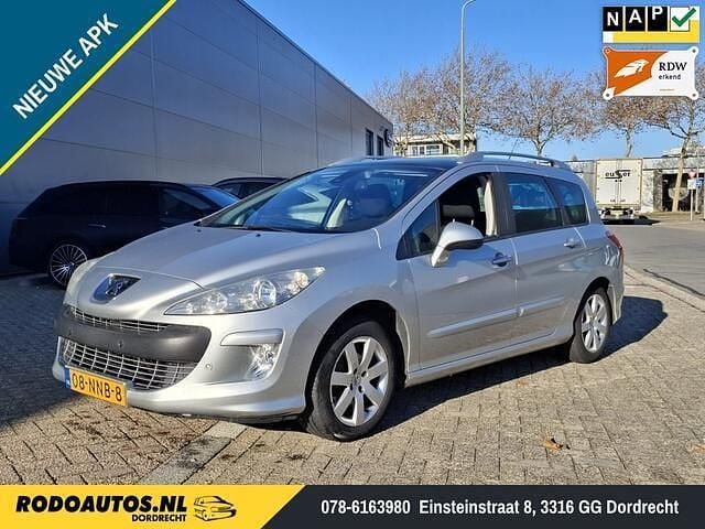 Grijs (metallic) Gebruikt 2010 Peugeot 308 Stationwagen | € 2.499 (Eerlijke prijs) - Afbeelding 1/4
