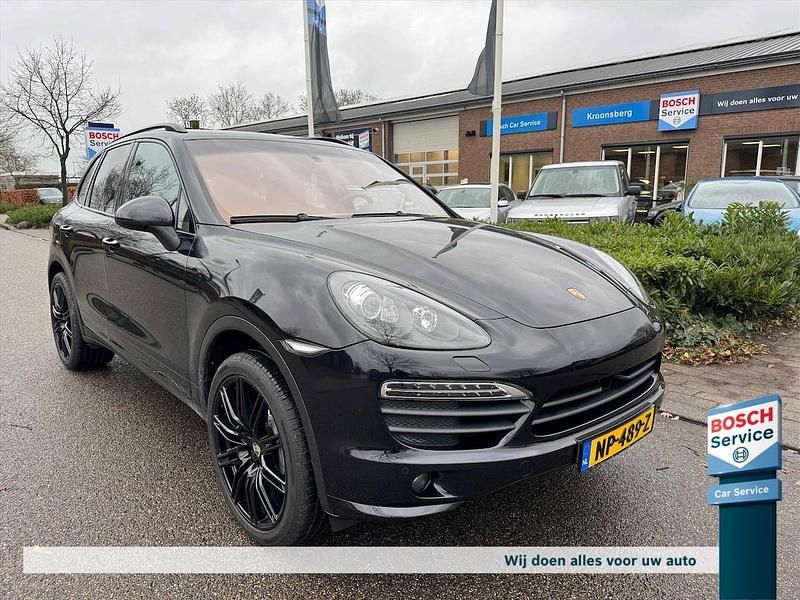 Zwart Occasion 2012 Porsche Cayenne SUV | € 25.900 (Goede deal) - Afbeelding 1/4