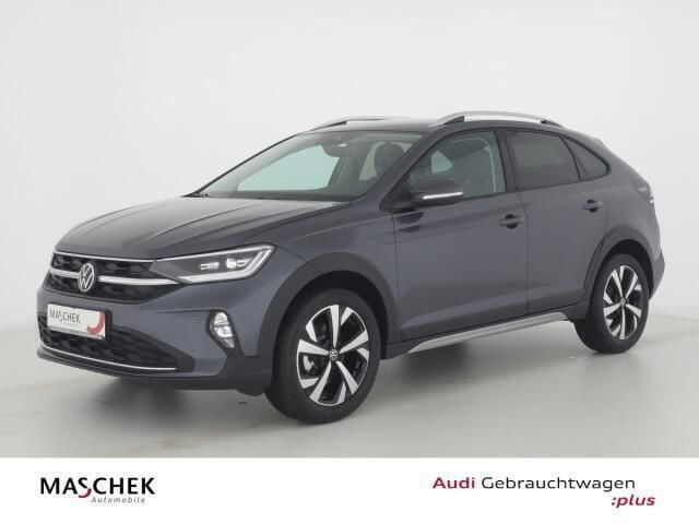 Grijs Gebruikt 2022 VW Taigo Style SUV | € 22.552 (Goede deal) - Afbeelding 1/4