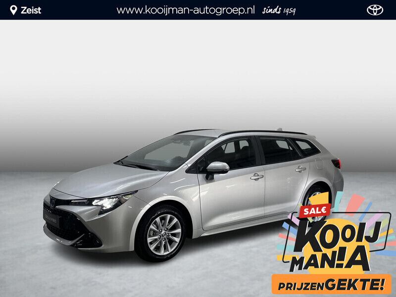Grijs Gebruikt 2024 Toyota Corolla Hybrid Active Stationwagen | € 36.900 - Afbeelding 1/4