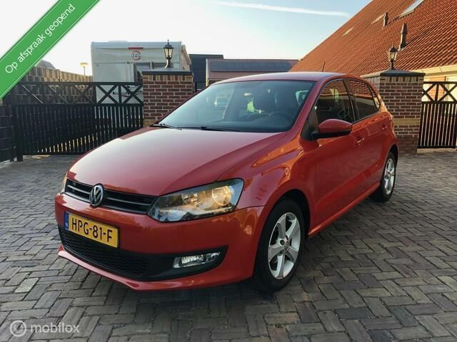 Oranje Gebruikt 2010 VW Polo Team Hatchback | € 5.595 (Eerlijke prijs) - Afbeelding 1/4