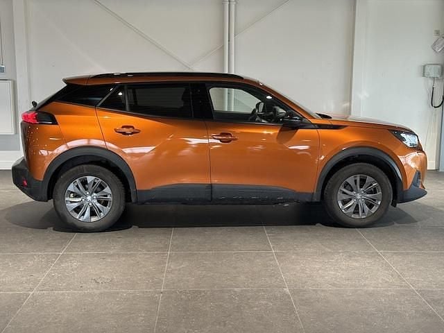 Occasion Peugeot e-2008 Style 100 kW (136 PK) 2023 Oranje SUV