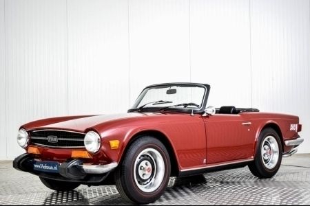 Carmine Gebruikt 1974 Triumph TR6 Cabriolet | € 29.900 - Afbeelding 1/4