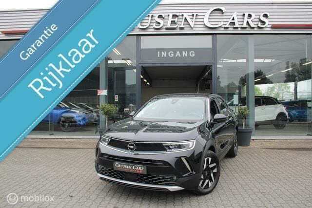 , metallic lak Gebruikt 2021 Opel Mokka Elegance SUV | € 18.950 (Eerlijke prijs) - Afbeelding 1/4