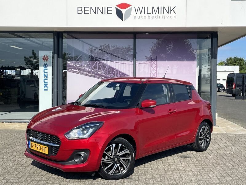 Rood Gebruikt 2021 Suzuki Swift Style Hatchback | € 16.450 (Eerlijke prijs) - Afbeelding 1/4