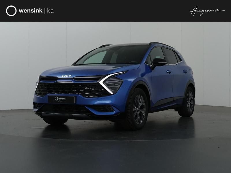 Blauw, metallic lak Gebruikt 2022 Kia Sportage SUV | € 36.335 (Eerlijke prijs) - Afbeelding 1/4