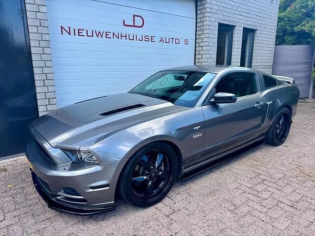 Grijs Gebruikt 2012 Ford Mustang GT Fastback Coupé | € 29.950 - Afbeelding 1/4
