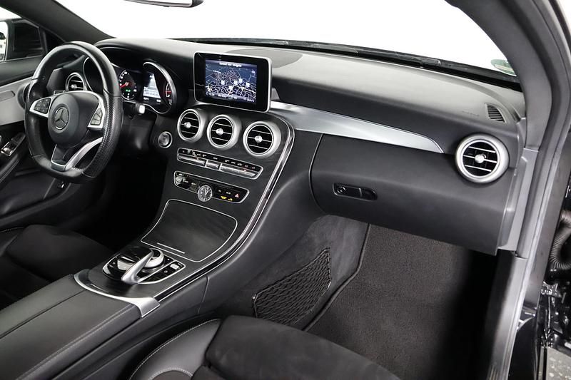 Occasion Mercedes C180 AMG line 156 PK (114 kW) 2016 Zwart Coupé