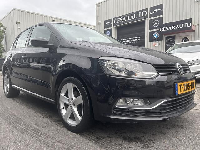 Zwart Occasion 2014 VW Polo Highline Hatchback | € 5.999 (Eerlijke prijs) - Afbeelding 1/4