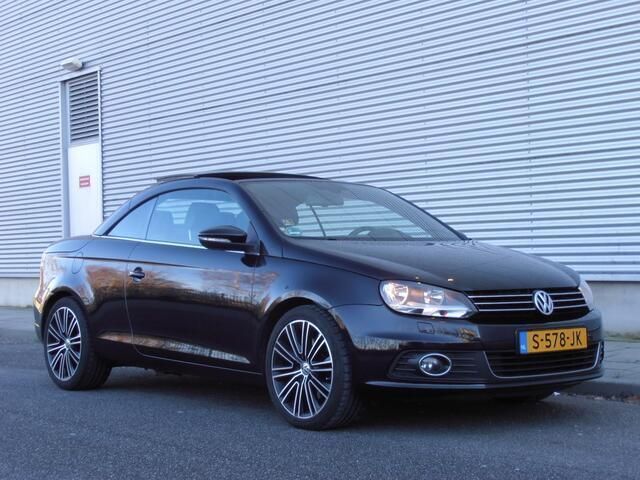 Zwart Gebruikt 2011 VW Eos Exclusive Cabriolet | € 11.250 - Afbeelding 1/4