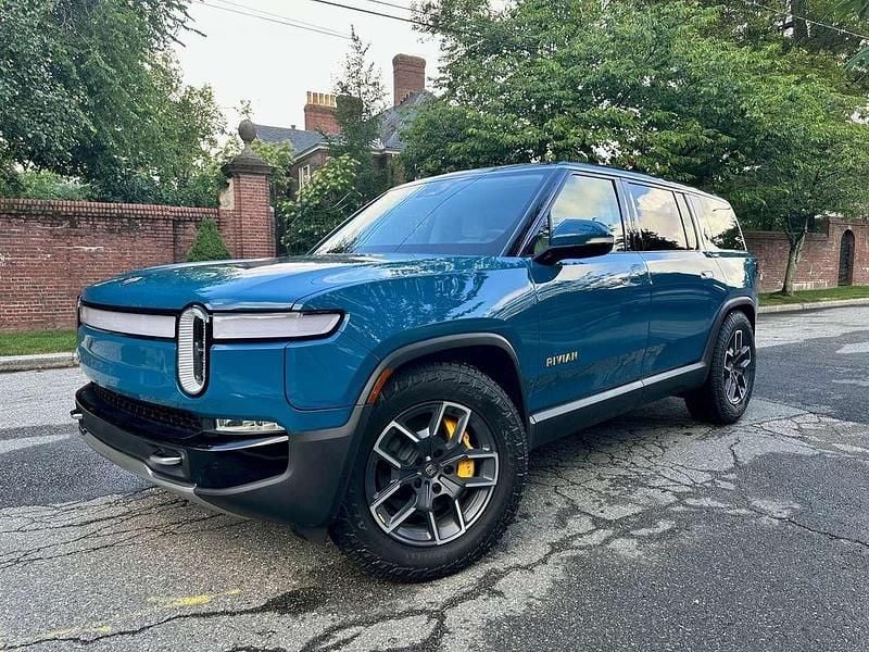 Blauw Gebruikt 2023 Rivian R1S SUV | € 98.809 - Afbeelding 1/4