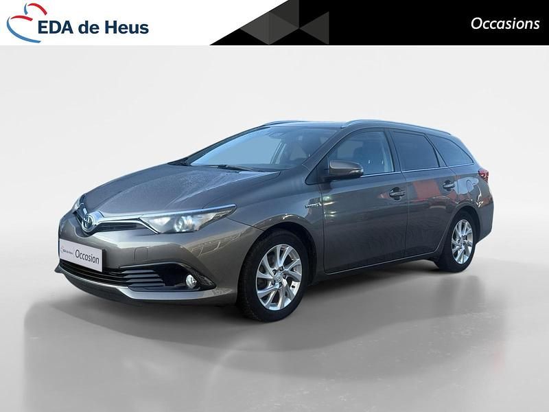 Grijs Occasion 2018 Toyota Auris Hybrid Stationwagen | € 18.435 (Eerlijke prijs) - Afbeelding 1/4