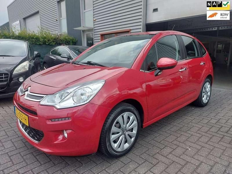 Rood, metallic lak Gebruikt 2015 Citroën C3 PureTech Hatchback | € 4.700 (Goede deal) - Afbeelding 1/4