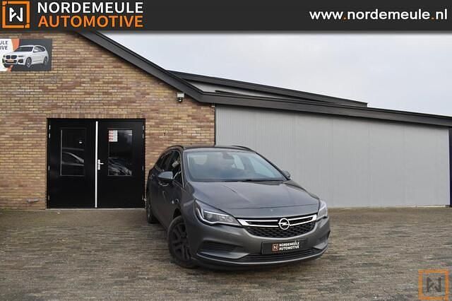Grijs Gebruikt 2018 Opel Astra Business Stationwagen | € 4.950 (Eerlijke prijs) - Afbeelding 1/4