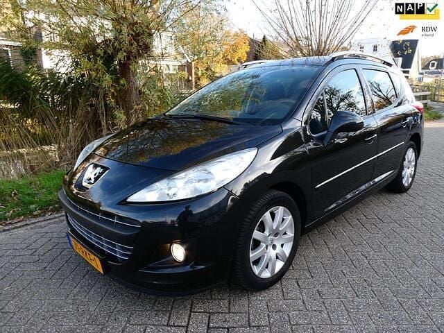 Zwart Gebruikt 2011 Peugeot 207 Sportium Stationwagen | € 3.245 (Eerlijke prijs) - Afbeelding 1/4