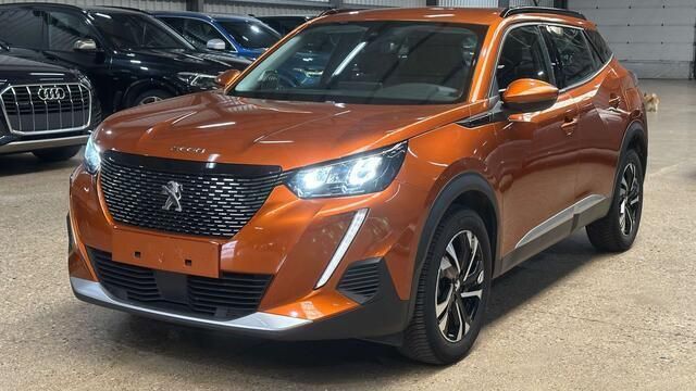 Oranje Gebruikt 2020 Peugeot 2008 Allure SUV | € 14.500 (Goede deal) - Afbeelding 1/4