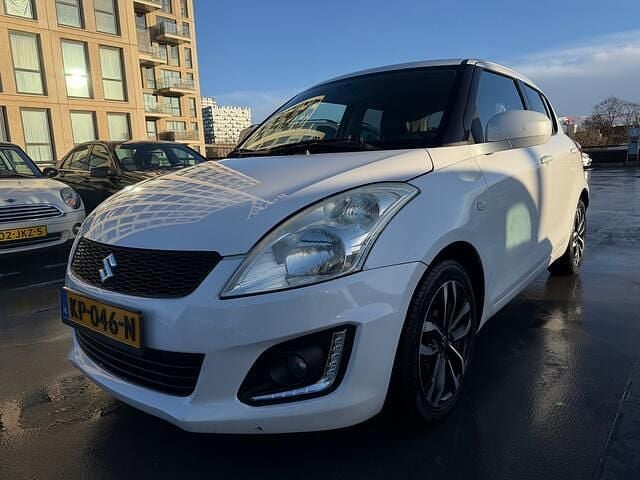Wit Gebruikt 2015 Suzuki Swift Comfort Hatchback | € 5.950 (Goede deal) - Afbeelding 1/4