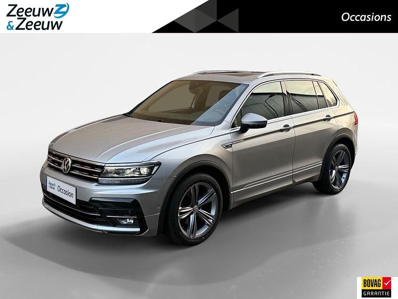 Tungsten silver metallic (grijs metallic) Occasion 2020 VW Tiguan Highline SUV | € 29.395 (Goede deal) - Afbeelding 1/4