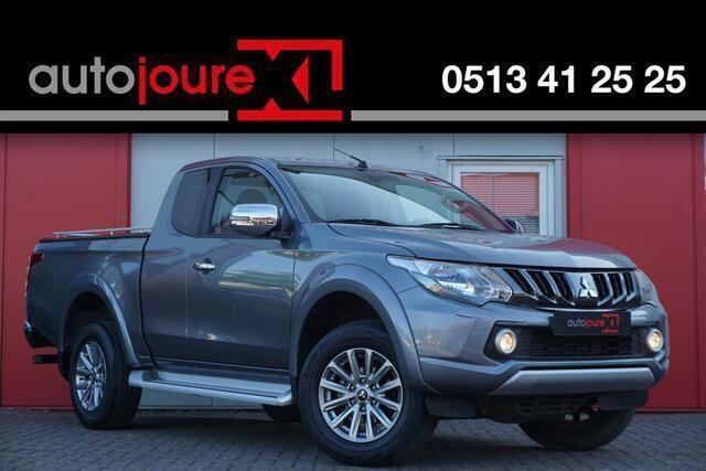 Grijs Gebruikt 2017 Mitsubishi L200 Intense Pickup | € 17.950 - Afbeelding 1/4