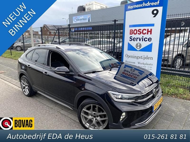 Zwart Gebruikt 2021 VW Taigo Style SUV | € 23.895 (Eerlijke prijs) - Afbeelding 1/4