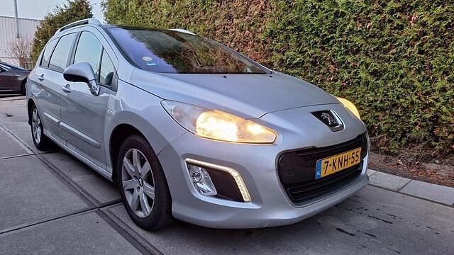 Occasion Peugeot 308 SW 114 PK (83 kW) 2013 Grijs Stationwagen