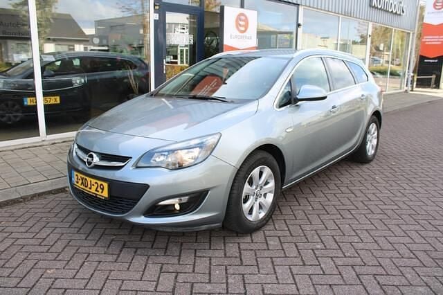 Grijs Gebruikt 2014 Opel Astra Stationwagen | € 6.950 (Eerlijke prijs) - Afbeelding 1/4