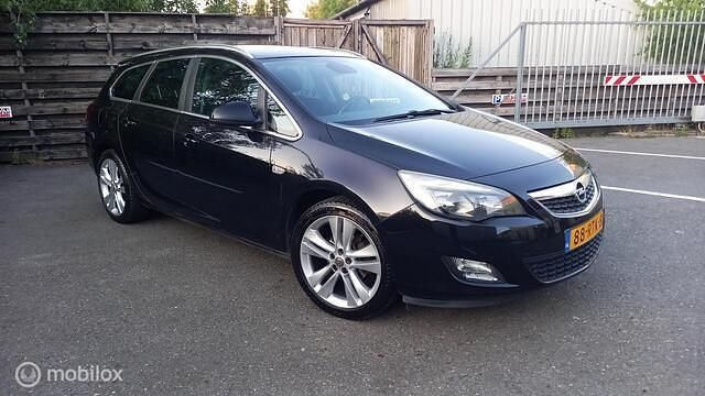 Occasion Opel Astra 140 PK (102 kW) 2011 Zwart Stationwagen