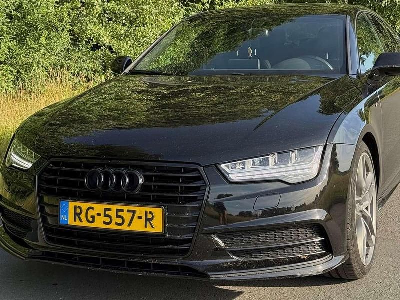 Zwart Gebruikt 2018 Audi A7 Hatchback | € 26.660 (Goede deal) - Afbeelding 1/4