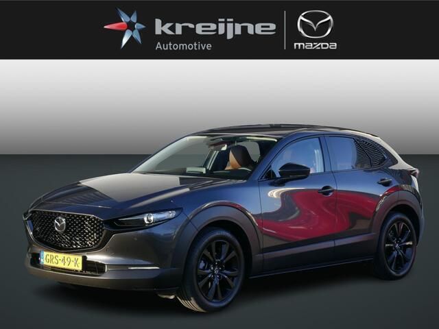 Machine grey Gebruikt 2024 Mazda CX-30 Nagisa SUV | € 37.925 - Afbeelding 1/4