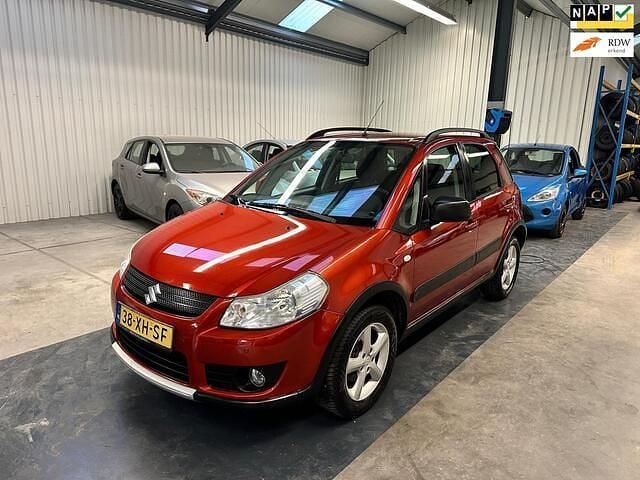 Oranje Gebruikt 2007 Suzuki SX4 Exclusive MPV | € 3.950 (Eerlijke prijs) - Afbeelding 1/4