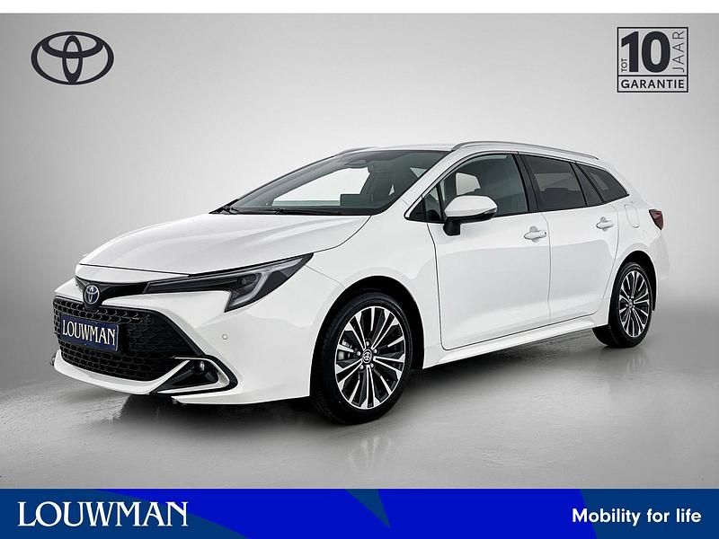 Wit Nieuw 2025 Toyota Corolla Hybrid Stationwagen | € 36.945 - Afbeelding 1/3