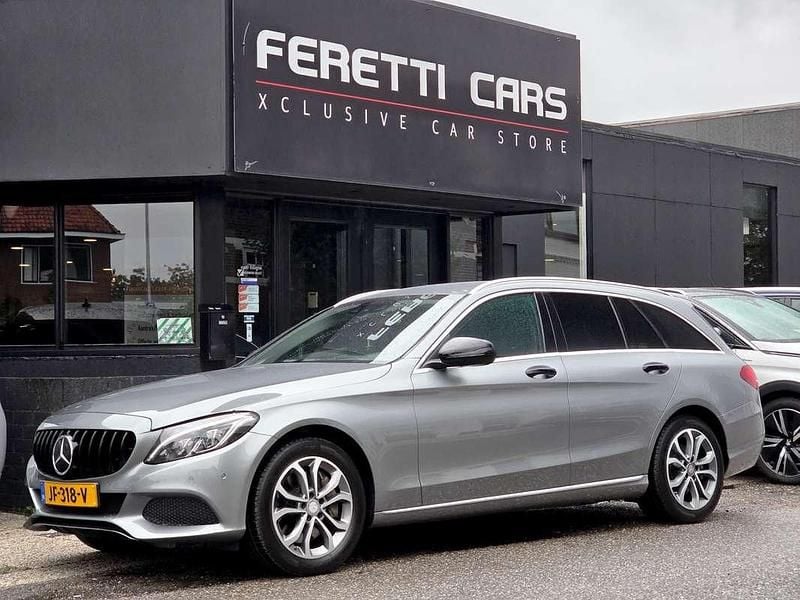 Grijs Gebruikt 2016 Mercedes C350e Edition Stationwagen | € 17.900 (Eerlijke prijs) - Afbeelding 1/4