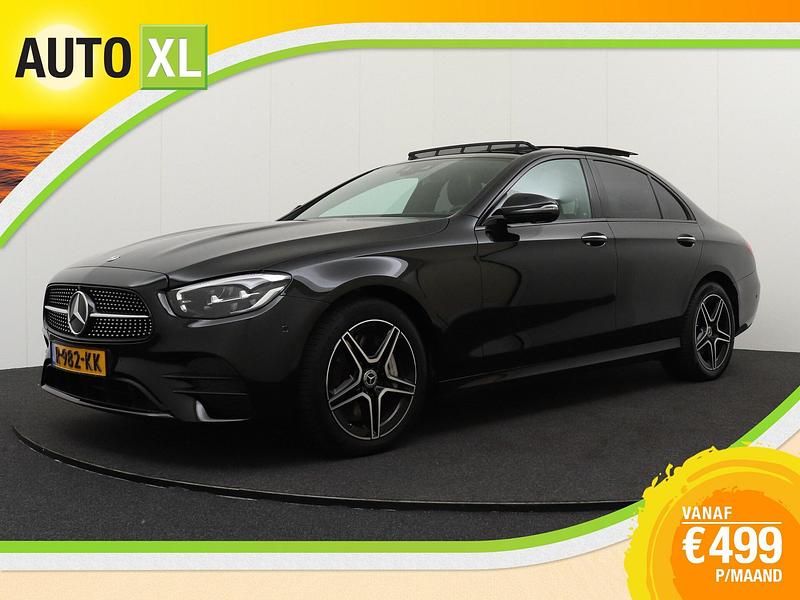 Zwart, metallic lak Gebruikt 2022 Mercedes E300 AMG line Sedan | € 47.940 (Eerlijke prijs) - Afbeelding 1/4